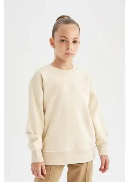 DeFacto Kız Çocuk Giyim Ürünleri Karşılaştırması: Sweatshirt ve Pantolon Özellikleri