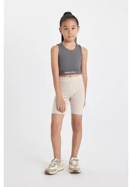 DeFacto Kız Çocuk Tayt Modelleri Karşılaştırması: Biker ve Kısa Boy Tayt Özellikleri