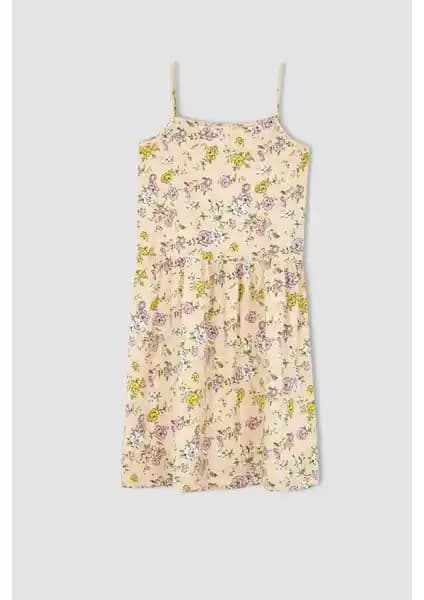 Kız Çocuk Elbiseleri Karşılaştırması: Pamuklu Yazlık ve Ekose Salopet Modelleri